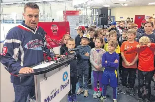  ?? JOE GIBBONS/TELEGRAM FILE ?? The Mount Pearl Minor Hockey Associatio­n food drive is getting bigger, and with national eyes on the city during the 2019 Rogers Hometown Hockey tour, it’s going to be in the spotlight. Here, president Trevor Murphy announces details of the Rogers Hometown Hockey weekend to be held in Mount Pearl on Nov. 17-18. The Sunday broadcast will take place from the Summit Centre parking lot at 9 p.m. local time.