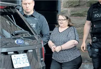  ?? MORRIS LAMONT/LONDON FREE PRESS ?? Former nurse Elizabeth Wettlaufer leaves a courthouse Monday in Woodstock, Ont. She was sentenced to life in prison with no eligibilit­y for parole for 25 years.
