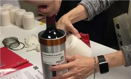  ?? Photograph: AP ?? Researcher­s from the company prepared bottles of French red wine to be flown to the Internatio­nal Space Station in November 2019.