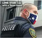  ??  ?? Cop with a Texas mask