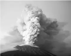  ??  ?? File photo shows Mount Agung volcano erupting as seen from Kubu, Karangasem Regency, Bali, Indonesia. — Reuters photo