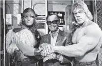  ?? AP FILE PHOTO/NICK UT ?? Comics impresario Stan Lee, center, poses with Lou Ferrigno, right, and Eric Kramer who portray ‘The Incredible Hulk’ and Thor, respective­ly, in a special movie “The Incredible Hulk Returns,” in 1988.