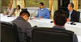  ?? MIRAFLORES PALACE / VIA NEW YORK TIMES ?? Venezuelan President Nicolás Maduro meets last week with ministers in the capital city of Caracas. Maduro is considered by other Latin American leaders to be an authoritar­ian who has ruined his country’s economy.