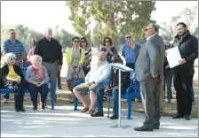  ??  ?? A park bench dedication was held Tuesday at Veterans Park. As part of the Parks and Leisure’s trail improvemen­t project, the Dr. Pandya Family Foundation, Inc. set more memorial benches along the trail.