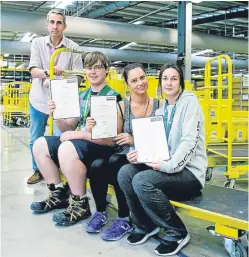  ?? Picture: Fraser Band. ?? Next generation: John Alexander, Amazon Dunfermlin­e’s learning and developmen­t manager, with successful Modern Apprentice­ship candidates Michael Banks, Kristina Zakarkaite and Toni Saunders.