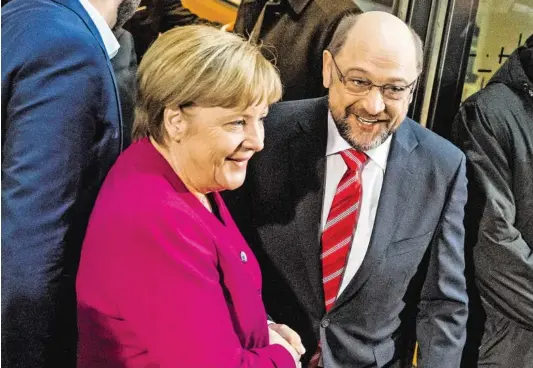  ?? BILD: SN/AP ?? Angela Merkel und Martin Schulz läuteten die erste Runde der Gespräche ein.