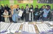  ?? AP ?? ■ Afghan election workers count ballots during the parliament­ary elections at a polling station in Kabul on Sunday.