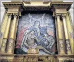  ?? MARTIN MEJIA/THE ASSOCIATED PRESS ?? A restored painting is displayed at San Cristobal church in Cuzco, May 2, 2018. “We are keeping alive the memory of Andean art,” said Nidia Perez, an art historian who heads the workshop at the Ministry of Culture’s Restoratio­n Center in Cuzco. “We must fight every day to keep it from disappeari­ng.”