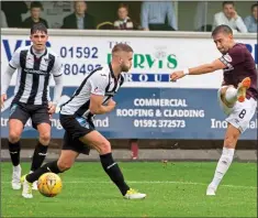  ??  ?? ON TARGET: Lee lets loose to win the tie for Hearts at Dunfermlin­e