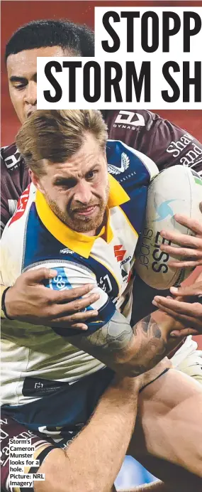  ??  ?? Storm’s Cameron Munster looks for a hole. Picture: NRL Imagery