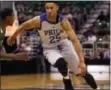  ?? THE ASSOCIATED PRESS FILE ?? Sixers rookie Ben Simmons, seen competing in a summer league game in July, underwent succesful surgery for a broken bone in his foot Tuesday, according to a team announceme­nt. No timetable has been set for his return, but sports columnist Jack...