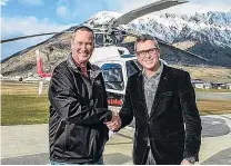  ?? PHOTO: SUPPLIED ?? Previously . . . Glacier Southern Lakes Helicopter­s owner Pat West (left) and then Ngai Tahu Tourism chief executive Quinton Hall when the helicopter company was sold to the iwi company in 2016.