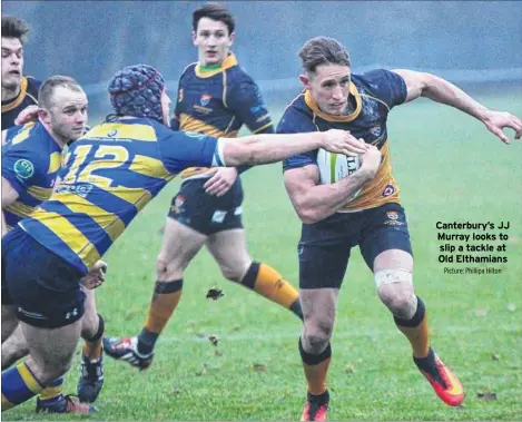  ?? Picture: Phillipa Hilton ?? Canterbury’s JJ Murray looks to slip a tackle at Old Elthamians