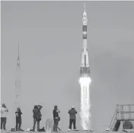  ?? BILL INGALLS / NASA VIA GETTY IMAGES ?? Flight Engineer Nick Hague of NASA and Flight Engineer Alexey Ovchinin of Roscosmos are now safely back on land after an aborted mission.