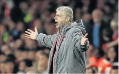  ?? / RICHARD HEATHCOTE/ GETTY IMAGES ?? Arsene Wenger prays for a miracle to finish above Liverpool.