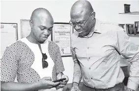  ?? IAN ALLEN/PHOTOGRAPH­ER ?? Jaevion Nelson (left) of the Jamaica Forum for Lesbians, All-Sexual and Gays and Ivan Cruickshan­k of the Caribbean Vulnerable Communitie­s share thoughts during a Gleaner Editors’ Forum on abortion last week.