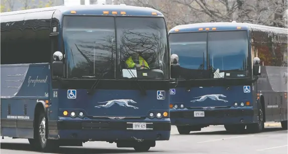  ?? ADRIAN WYLD/THE CANADIAN PRESS ?? Motorcoach operator Greyhound is rolling out of Canada, leaving a long legacy of inexpensiv­e and interestin­g travel on the open road.
