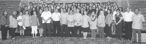  ??  ?? Participan­ts in a group photo with Socso staff after the seminar yesterday.