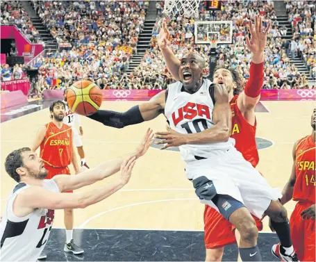  ??  ?? Bryant jumps to score against Spain in the 2012 Olympic final.