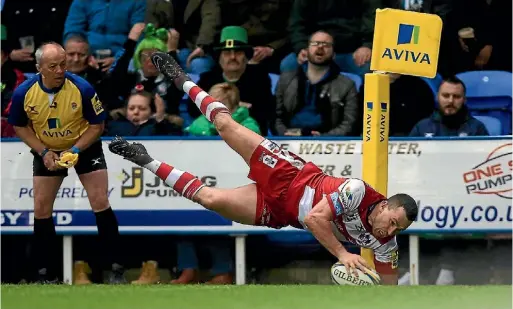  ?? GETTY IMAGES ?? Tom Marshall scores the second of his two tries in Gloucester’s win over his brother James’ London Irish side.