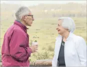  ??  ?? Stanley Fischer, the vice-chairman of the US Federal Reserve (left), and Janet Yellen, the chairwoman, talk outside the Jackson Lake Lodge at the Jackson Hole economic symposium on Friday. Central bankers are struggling to spur slow growth.