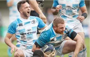  ??  ?? Finishing touch: Sean Cronin celebrates his try with Jamison Gibson-Park