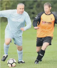  ??  ?? Rolls-Royce (pale blue) take on Washington JFC Biddick Inn in the Over40s League last week