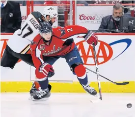  ??  ?? Capitals defenceman Matt Niskanen, right, vies with Ducks centre Ryan Kesler.