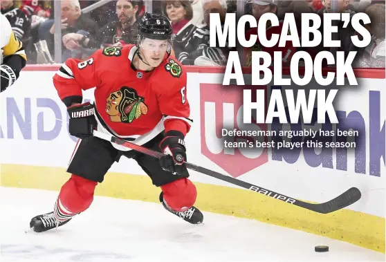 ?? JAMIE SABAU/GETTY IMAGES ?? Jake McCabe is a plus-3 on a team with a minus-59 goal differenti­al, and his 10 points rank second among Blackhawks defensemen.