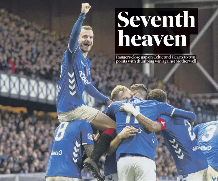  ??  ?? 0 Andy Halliday gets carried away with the celebratio­ns after Scott Arfield put Rangers 5-1 in front against Motherwell at Ibrox yesterday. The hosts won the Premiershi­p clash 7-1.Report, pages 4-5