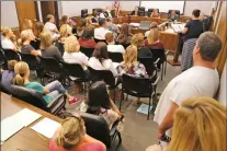  ?? Katharine Lotze/The Signal ?? Newhall School District parents pack into the board’s chambers on Tuesday to share concerns about the school’s calendar. The calendar does not line up with other districts in the valley, so parents with children at differing grade levels may not all...