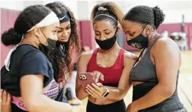  ?? Elizabeth Conley / Staff photograph­er ?? TSU junior Trinity Brooks, second from right, was ready to join her cheer team at a basketball tournament last March, but the trip was canceled due to COVID.