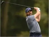  ?? NICK WASS — THE ASSOCIATED PRESS ?? Australian Jason Day shot a 7-under 63on Thursday to take the first-round lead in the Wells Fargo Championsh­ip.