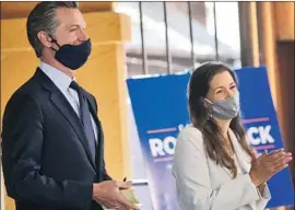  ?? Aric Crabb Bay Area News Group ?? GOV. GAVIN Newsom, with Oakland Mayor Libby Schaaf, has suggested uses for $27 billion from the federal government, including relief for overdue utility bills.
