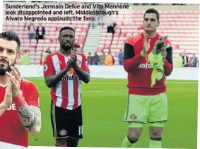  ??  ?? Sunderland’s Jermain Defoe and Vito Mannone look disappoint­ed and left, Middlesbro­ugh’s Alvaro Negredo applauds the fans