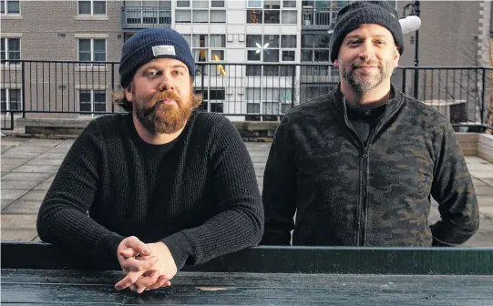  ?? RYAN TAPLIN • THE CHRONICLE HERALD ?? John House and David Woodley, co-owners of Black Sheep, pose on the rooftop patio of the former Red Stag Tavern in the Brewery Market on Monday. Black Sheep will be moving to the new spot, which is about triple the size of its location on Dresden Row, in the new year.