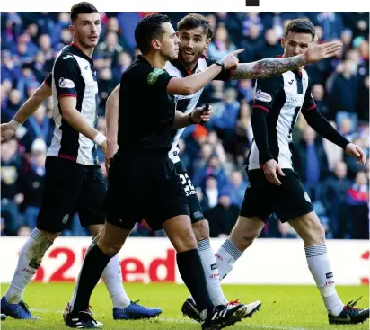  ??  ?? Biggest loser: Andrew Dallas has garnered notoriety for awarding four penalties against St Mirren at Ibrox