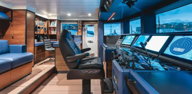  ??  ?? mothership. beLoW: The wheelhouse is practical, spacious and tastefully finished to the same high standard as the guest areas.