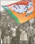  ?? PTI ?? Supporters of the BJP celebrate the party's victory in Gandhinaga­r on Monday