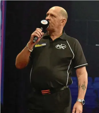  ?? PHOTO: CONTRIBUTE­D ?? ON POINT: Respected darts referee and caller Russ Bray will be in charge of the Pro Darts Showdown Series early in the new year.