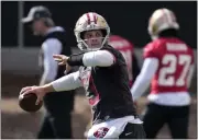  ?? JOHN LOCHER — THE ASSOCIATED PRESS ?? Niners quarterbac­k Brock Purdy throws during practice ahead of the Super Bowl 58on Wednesday in Las Vegas.