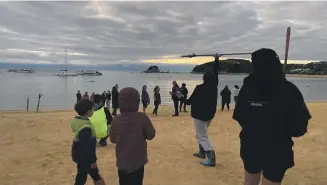  ?? KATY JONES/STUFF ?? Mana whenua gathered at Kaiteriter­i early on Tuesday to rehearse a pōwhiri for four waka hourua as part of the Te Hau Kōmaru festival which is happening in Te Waipounamu (The South Island) for the first time.