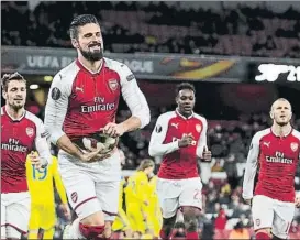  ?? FOTO: GETTY IMAGES ?? Giroud celebra su gol El Arsenal marcó seis tantos ante el BATE Borisov