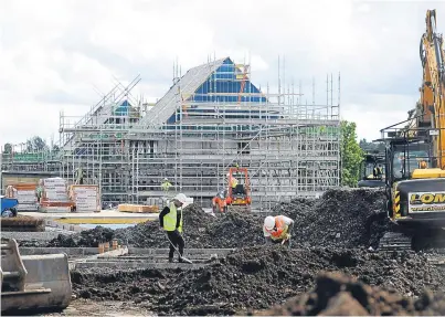  ??  ?? Ongoing constructi­on work to build new housing at Finavon Terrace, Dundee. Picture: Kim Cessford.