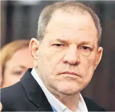  ??  ?? Film producer Harvey Weinstein stands inside Manhattan Criminal Court during his arraignmen­t in Manhattan in New York, US, May 25. — Reuters photo