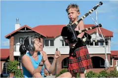  ?? BARRY HARCOURT ?? Sandra Soper and son Dylan prepare for the Te Anau Tartan Festival.