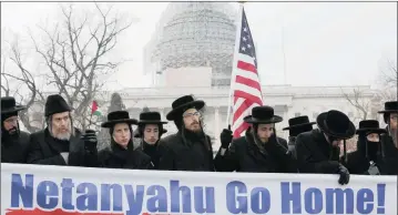  ?? Picture: REUTERS ?? DISCONTENT: Anti-Zionist Orthodox rabbis protest against Israeli Prime Minister Benjamin Netanyahu’s speech to a joint meeting of Congress on Capitol Hill in Washington on March 3.