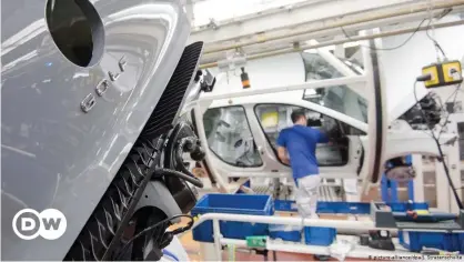  ??  ?? VW has been forced to reduce production at its Wolfsburg plant because of a chip shortage