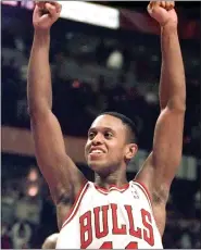  ?? ASSOCIATED PRESS FILE PHOTO ?? Chicago Bulls’ B.J. Armstrong celebrates the Bulls’ 77-66 win in 2000 over the Washington Wizards in Chicago. Armstrong earned three rings with the Chicago Bulls, as part of their NBA championsh­ip teams in 1991, 1992and 1993.