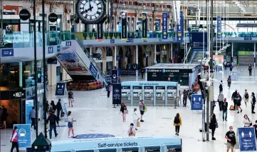  ??  ?? Empty: Waterloo station would normally be teeming with commuters travel